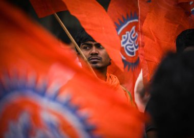 NEW DELHI INDIA MAY 1 2023 Members of the Vishwa Hindu Parishad and Bajrang Dal shouted slogans during a symbolic protest against the Congress Party s remarks about Bajrang Dal outside the AICC headquarters at Akbar Road on May 2 2023 in New Delhi In clipart