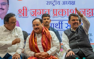 MUMBAI INDIA MAY 17 2023 Bharatiya Janata Party national President JP Nadda Devendra Fadnavis Deputy Chief Minister of Maharashtra attend Labharthi Sammelan at RBK Hall Ghatkopar Mankhurd Link Road on May 17 2023 in Mumbai India Photo by Satish Bate  clipart