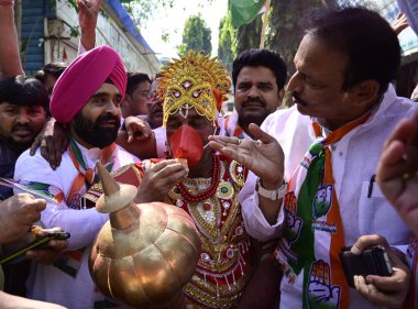 MUMBAI INDIA MAY 13 2023 Congress workers celebrate the victory after the party sweeps Karnataka assembly elections with absolute majority at MRCC Office Azad Maidan on May 13 2023 in Mumbai India Congress has won 135 seats well above the majority ma clipart