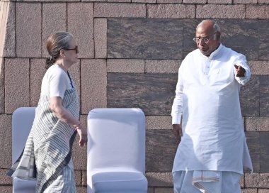 NEW DELHI INDIA MAY 21 2023 Congress President Mallikarjun Kharge former president Sonia Gandhi arrive to pay tribute to former prime minister Rajiv Gandhi on his 32nd death anniversary at his memorial Veer Bhumi on May 21 2023 in New Delhi India Tod clipart