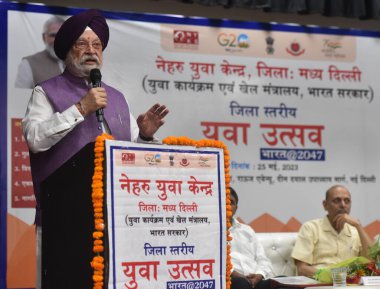 NEW DELHI INDIA MAY 25 2023 Union Minister of Housing Affairs and Petroleum and Natural Gas Hardeep Singh Puri addressing the Youth People during the district level mega Yuva Utsav 2023 Organized by Nehru Yuva Kendra Central Delhi at Sarvodyala Bal V clipart