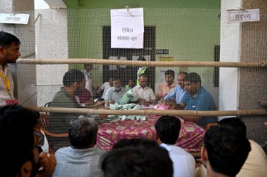 GREATER NOIDA INDIA MAY 13 2023 Election Commission staff counting Ballot paper of local bodies election votes at Mihir Bhoj PG College in Dadri on May 13 2023 in Greater Noida India The Bhartiya Janata Party swept the Uttar Pradesh local body polls  clipart