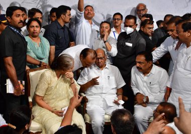 MUMBAI INDIA MAY 2 2023 Nationalist Congress Party NCP chief Sharad Pawar with his wife at the launch of the second part of his autobiography Lok Majhe Sangati Political Autobiography made the announcement of his retirement at Y B Chavan Centre Narim clipart