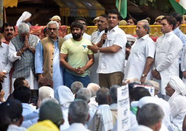 NEW DELHI INDIA MAY 5 2023 DPCC president Anil Choudhary along with Wrestlers Bajrang Punia and others during their protest against the Wrestling Federation of India presidentBrij Bhushan Sharan at Jantar Mantar on May 5 2023 in New Delhi India Wrest clipart