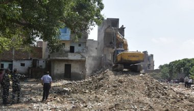 NEW DELHI INDIA MAY 31 2023 Demolition drive by DDA on illegal construction at DDA Land at Kasturba Nagar on May 31 2023 in New Delhi India Photo by Sonu Mehta Hindustan Times  clipart