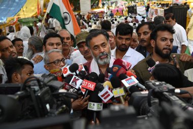 NEW DELHI INDIA MAY 21 2023 Yogendra Yadav an Indian activist addresses media during the ongoing protest of Indian wrestlers at Jantar Mantar on May 21 2023 in New Delhi India Photo by Sanchit Khanna Hindustan Times  clipart