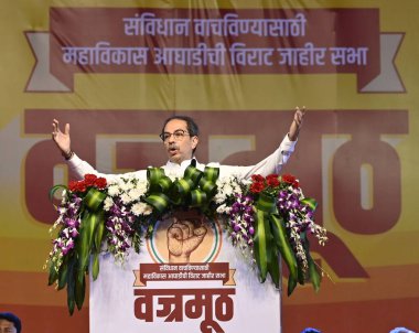 MUMBAI INDIA MAY 1 2023 Shiv Sena Uddhav Balasaheb Thakeray leader Uddhav Thackeray addresses the gathering in the presence of NCP leaders Ajit Pawar Jayant Patil and Jitendra Awhad Congress leaders Nana Patole Balasaheb Thorat and Ashok Chavan durin clipart