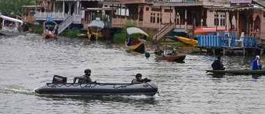 SRINAGAR INDIA MAY 17 2023 Navy s Marine Commandos MARCOS patrol ahead of upcoming G20 meeting in Dal Lake on May 17 2023 in Srinagar India Photo By Waseem Andrabi Hindustan Times  clipart