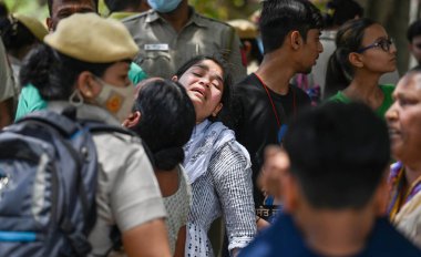 NEW DELHI INDIA MAY 22 2023 Residents weeping and pleading to the authorities during a Demolition drive by DDA at Kasturba Nagar near Vishwas Nagar on May 22 2023 in New Delhi India Photo by Raj K Raj Hindustan Times  clipart