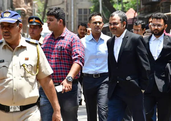 stock image MUMBAI INDIA MAY 22 2023 Former Zonal Director of Mumbai Narcotics Control Bureau Sameer Wankhede being escorted outside the Bombay High Court after the court extended his interim protection against coercive action in the bribery case in connection w