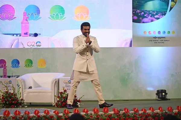 stock image SRINAGAR INDIA MAY 22 2023 Film star Ram Charan greets a G20 delegate during meeting of G20 at Sher e Kashmir International Convention Centre SKICC on May 22 2023 in Srinagar India Photo By Waseem Andrabi Hindustan Times 