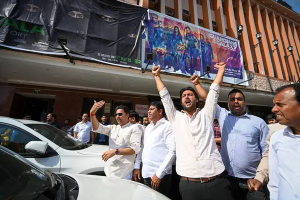 stock image NEW DELHI INDIA MAY 8 2023 Supporters of BJP raises slogans before the exclusive screening of the movie The Kerala Story by Delhi BJP at Delite Cinema