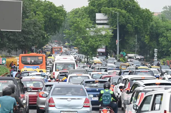 stock image NEW DELHI, INDIA - AUGUST 23: Traffic Jam at Sardar Patel Marg near Dhaula Kuan Metro Station and Ring road due to waterlogging under Dhaula Kuan flyover after heavy rain, on August 23, 2024 in New Delhi, India. (Photo by Sonu Mehta/Hindustan Times 