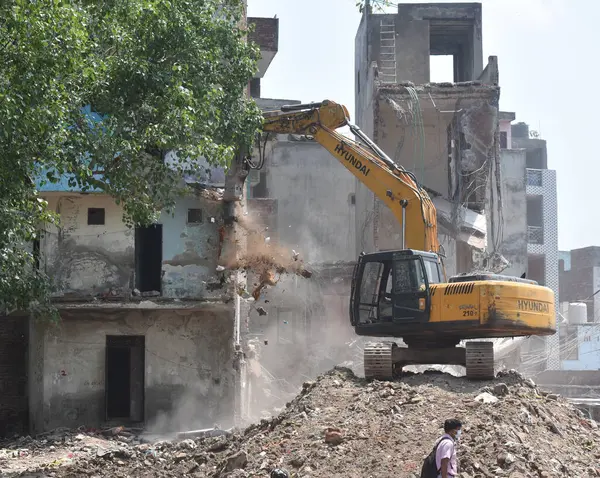 stock image NEW DELHI INDIA MAY 31 2023 Demolition drive by DDA on illegal construction at DDA Land at Kasturba Nagar on May 31 2023 in New Delhi India Photo by Sonu Mehta Hindustan Times 