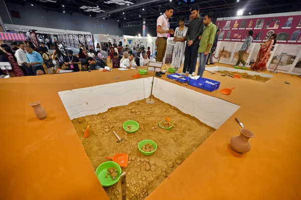 stock image NEW DELHI INDIA MAY 18 2023 Visitors at a Archaeological Survey of India ASI stall during the International Museum Expo 2023 at Pragati Maidan on May 18 2023 in New Delhi India Photo by Sanjeev Verma Hindustan Times 