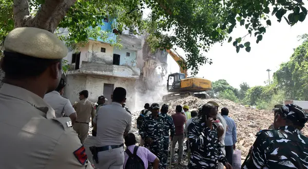 stock image NEW DELHI INDIA MAY 31 2023 Demolition drive by DDA on illegal construction at DDA Land at Kasturba Nagar on May 31 2023 in New Delhi India Photo by Sonu Mehta Hindustan Times 