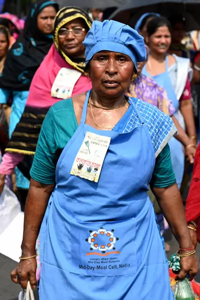 stock image KOLKATA INDIA MAY 30 2023 Association of Mid Day Meal Assistant AMMA workers in a rally demands minimum wages under Government rate salary of 12 month instead of 10 month increment in allowance payment of allowance through bank account grants during 