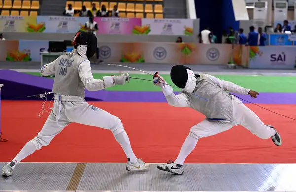 stock image LUCKNOW INDIA MAY 31 2023 Satvik from Banglore University vs Ajay Sinh HIU during Mens Fencing pool round under Khelo India University Games at Atal Vihari Ekana Sports city on May 31 2023 in Lucknow India Photo by Deepak Gupta Hindustan Times 