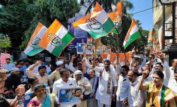 stock image MUMBAI INDIA MAY 13 2023 Congress workers celebrate victory as the party sweeps Karnataka assembly elections at Thane Congress Office in Thane on May 13 2023 in Mumbai India Congress has won 135 seats well above the majority mark of 113 seats in a 22