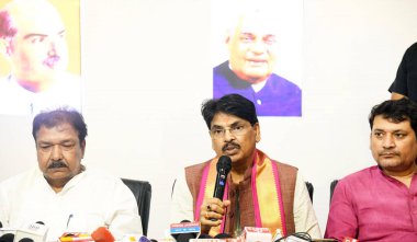 PATNA INDIA AUGUST 27 2024 NDA winning candidate Manan Mishra with Bihar BJP president Dilip Jaiswal addressing a press conference at BJP office on August 27 2024 in Patna India Photo by Santosh Kumar Hindustan Times  clipart