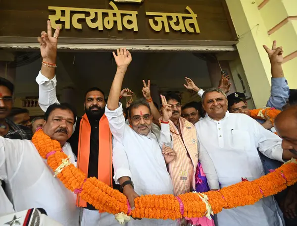 stock image PATNA INDIA AUGUST 27 2024 Bihar Deputy Chief Minister Samrat Chaudhary with NDA candidates Upendar Kushwaha and Manan Kumar Mishra flash victory sign after the Rajya Sabha result at Bihar Assembly on August 27 2024 in Patna India Photo by Santosh Ku