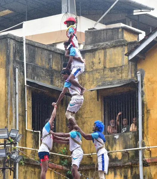 stock image MUMBAI INDIA AUGUST 27 2024 Govinda Mandal breaking Dahi handi at Lalbaug area Dahi handi during the Dahi Handi Festival on August 27 2024 in Mumbai India Photo by Bhushan Koyande Hindustan Times 