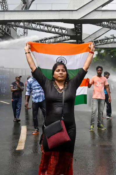 stock image KOLKATA INDIA AUGUST 27 2024 Police uses water cannon during March towards State Secretariat Nabanna called by Paschimbanga Chhatrasamaz Students Society of West Bengal seeking resignation of CM Mamata Banerjee over alleged rape and murder of a train