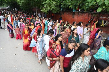 NEW DELHI INDIA AUGUST 26 2024 Devotees line up for offering prayer on the Janmashtami festival Iskcon Temple Sant Nagar East of Kailash on August 26 2024 in New Delhi India Photo by Sonu Mehta Hindustan Times  clipart