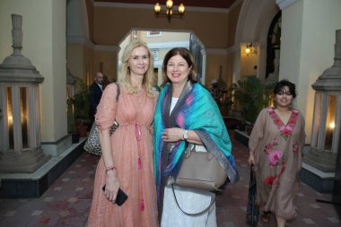 NEW DELHI INDIA MAY 23 2023 Katrin Kivi Estonia ambassador to india R during the opening of an Italian art exhibition titled The Grand Italian Vision the ongoing showcase features an anthology of 70 masterpieces from the Farnesina Collection comprisi clipart