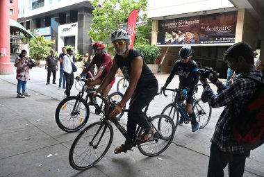 MUMBAI INDIA JUNE 3 2023 Fitness icon Milind Soman participates in a cycle rally along with 250 cyclists on World Cycle Day organized by Lifelong Online Retail Pvt Ltd at Andheri on June 3 2023 in Mumbai India Photo by Vijay Bate Hindustan Times  clipart