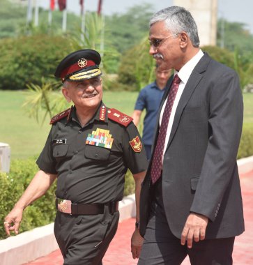 NEW DELHI INDIA JUNE 5 2023 Chief of Defence Staff CDS of the Indian Armed Forces Lt General Anil Chauhan along with Defence secretary of India Giridhar Aramane during the US Secretary of Defence Lloyd Austin inspect Tri Service Guard of Honour and a clipart