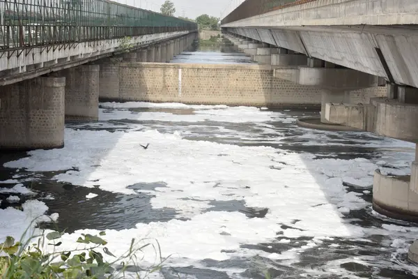 stock image NEW DELHI INDIA JUNE 2 2023 A view of the toxic foam floating on the Yamuna water near ITO on June 2 2023 in New Delhi India The hazardous foam floating on the Yamuna is a result of increased levels of Ammonia and high phosphate content caused by the