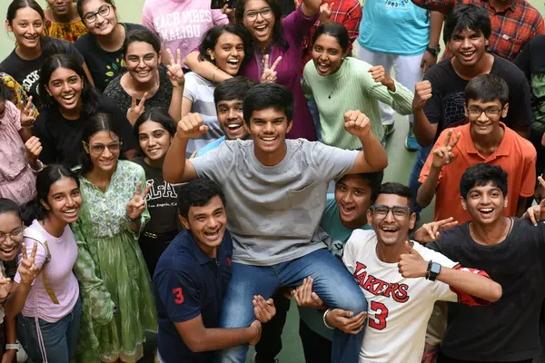 stock image NAVI MUMBAI INDIA JUNE 2 2023 Students of Fr Agnel Multipurpose School and Junior College celebrate success with topper Nair Avneesh Amar who secured 984% after the SSC Board Exam results were declared at Vashi on June 2 2023 in Navi Mumbai India Thi