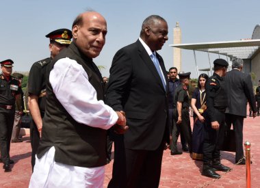 NEW DELHI INDIA JUNE 5 2023 Union Defence Minister of India Rajnath Singh hand shake with US Secretary of Defence Lloyd Austin during the inspect Tri Service Guard of Honour at Manekshaw Centre Delhi Cantt on June 5 2023 in New Delhi India Photo by S clipart