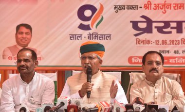 NEW DELHI INDIA JUNE 12 2023 Minister of Law and Justice and Minister of State for Parliamentary Affairs and Culture Arjun Ram Meghwal Delhi BJP President Virendra Sachdeva and MP Ramesh Bidhuri addressing a press conference on the 9 Years completion clipart