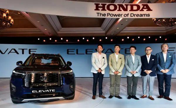 stock image NEW DELHI INDIA JUNE 6 2023 Vice President Marketing and Sales Honda Cars India Ltd Kunal Behl President and CEO Honda Cars India Ltd Takuya Tsumura Head of Regional Unit Asia and Oceania Honda Motor Co Ltd and President and CEO Asian Honda Motor Co 