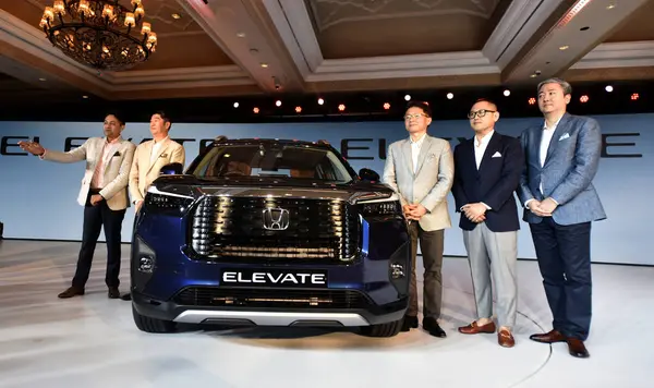 stock image NEW DELHI INDIA JUNE 6 2023 Vice President Marketing and Sales Honda Cars India Ltd Kunal Behl President and CEO Honda Cars India Ltd Takuya Tsumura Head of Regional Unit Asia and Oceania Honda Motor Co Ltd and President and CEO Asian Honda Motor Co 