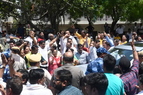 stock image NEW DELHI INDIA JUNE 8 2023 BJP party workers and supporters shouting slogans against Delhi CM Arvind Kejriwal outside the new campus of the Guru Gobind Singh Indraprastha University GGSIPU during the inauguration of the new campus of the Guru Gobind