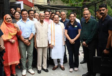 CHANDIGARH INDIA JUNE 15 2023 BJP National President JP Nadda met with Olympian and Arjuna Awardee sport shooter Anjum Moudgil at her residenceas part of the Sampark Se Samarthan campaign on June 15 2023 in Chandigarh Inida Nadda shared the booklet o clipart