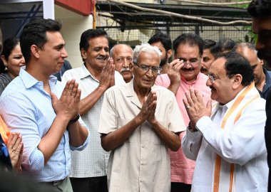 CHANDIGARH INDIA JUNE 15 2023 BJP National President JP Nadda welcomed by the Family members of Olympian and Arjuna Awardee sport shooter Anjum Moudgil at her residence on June 15 2023 in Chandigarh Inida Nadda is in Chandigarh as part of the Sampark clipart