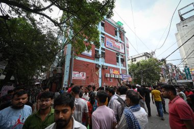 NEW DELHI INDIA JUNE 16 2023 People gathered outside the Coaching center where massive fire was broke out yesterday at Commercial Complex near Batra Cinema Mukherjee Nagar on June 16 2023 in New Delhi India Sixty one students were injured while tryin clipart