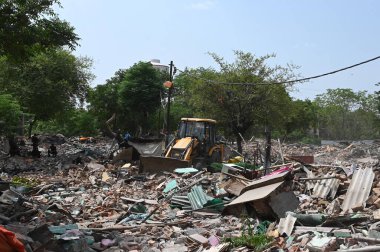 NEW DELHI INDIA JUNE 16 2023 A demolition drive carried out by the National Disaster Response Force NDRF in Priyanka Gandhi camp at Vasant Vihar on June 16 2023 in New Delhi India The demolition has resulted in the displacement of approximately 97 fa clipart