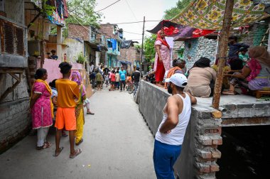 NEW DELHI INDIA JUNE 18 2023 A view of the spot where two women were allegedly shot dead by unidentified men over money settlement issue at Ambedkar Basti RK Puram on June 18 2023 in New Delhi India The incident took place in the early hours of Sunda clipart