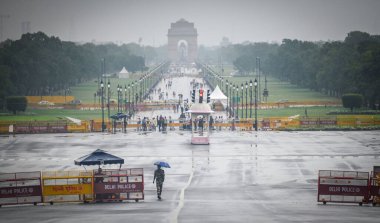 NEW DELHI INDIA JUNE 25 2023 A view of Vijay Chowk during light rain on June 25 2023 in New Delhi India Heavy rainfall accompanied by lightning lashed several parts of the national capital Delhi and its adjoining areas in the early hours of Sunday Th clipart