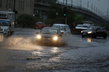 NEW DELHI INDIA JUNE 25 2023 Waterlogged at Kalindi Kunj road towards Noida after heavy rainfall overnight on June 25 2023 in New Delhi India Heavy rainfall accompanied by lightning lashed several parts of the national capital Delhi and its adjoining clipart