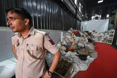 NEW DELHI INDIA JUNE 26 2023 Marijuana along with other drugs puts on display before gets destroyed by Delhi Police officials during a Mass drug destruction program on the occasion of International Day against Drugs Abuse and Illicit Trafficking at a clipart