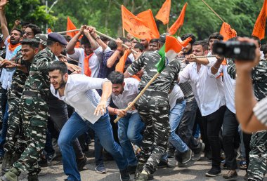 NEW DELHI INDIA JUNE 27 2023 Members of Akhil Bharatiya Vidyarthi Parishad ABVP Students union protest near Delhi Chief Minister Arvind Kejriwal s residence against the alleged unauthorised coaching classes around north campus area on June 27 2023 in clipart