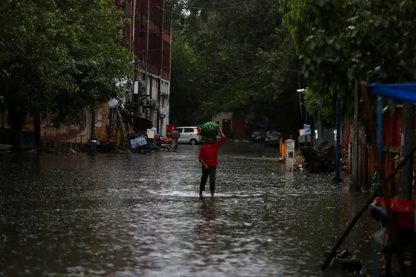 stock image NEW DELHI INDIA JUNE 25 2023 Waterlogged at Gaffar Manzil road near Jamia Millia Islamia after heavy rainfall overnight on June 25 2023 in New Delhi India Heavy rainfall accompanied by lightning lashed several parts of the national capital Delhi and 