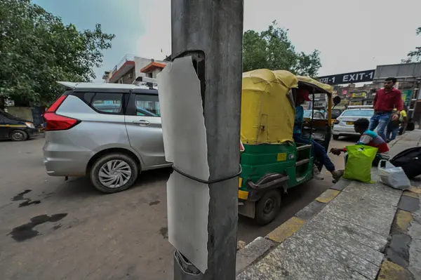 stock image NEW DELHI INDIA JUNE 26 2023 Workers Repairing the an open electric circuit breaker box or a breaker box at New Delhi Railway station parking Area on June 26 2023 in New Delhi India A 35 year old woman who stepped onto a flooded street at the New Del