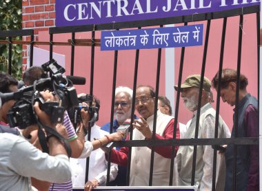 NEW DELHI INDIA JUNE 28 2023 BJP leaders Satya Narayan Jatia and Lal Bihari Tiwari along with Vijay Goel Jailed during Emergency Exhibition and Tihar Jail Demo at Rajiv Chowk Metro Station on June 28 2023 in New Delhi India BJP leaders and supporters clipart